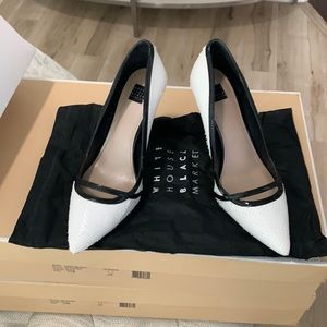 Black and white leather snake high heel pumps. Very good condition. Worn once.